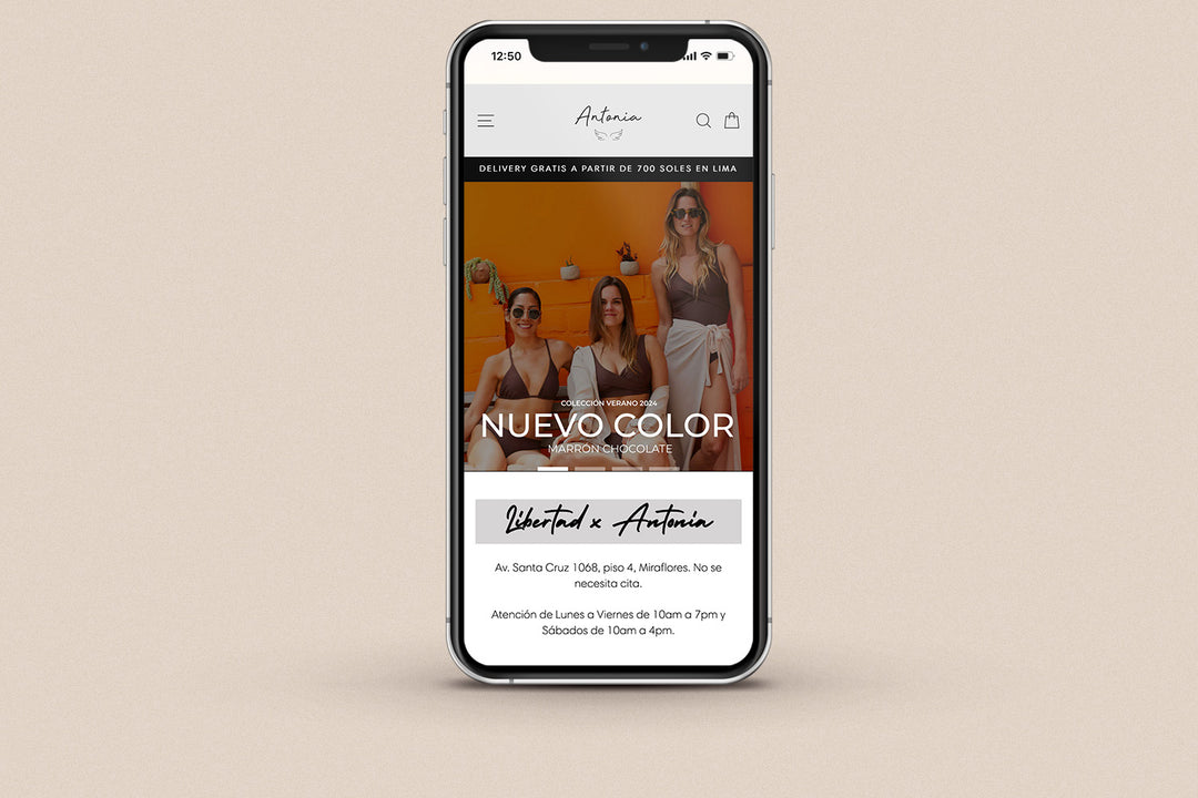 Imagen de un iphone con la web de Antonia Bikinis en su pantalla.