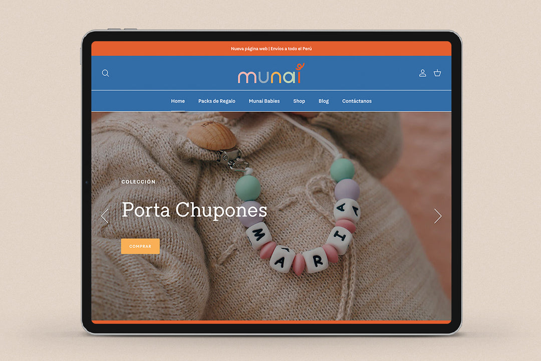 Imagen de un ipad con la web de  Munai en su pantalla.