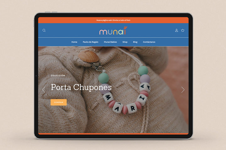 Imagen de un ipad con la web de  Munai en su pantalla.