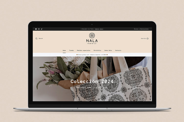Imagen de una laptop con la web de nala en su pantalla.
