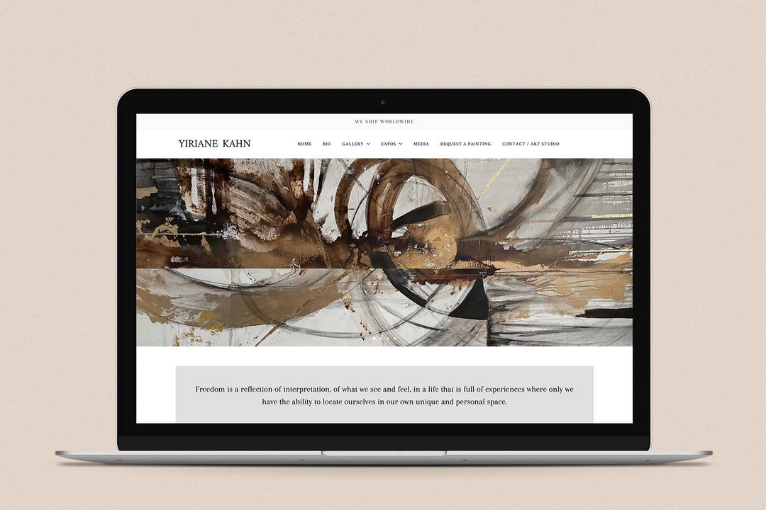 Imagen de una laptop con la web de  Yiriane Kahn en su pantalla.