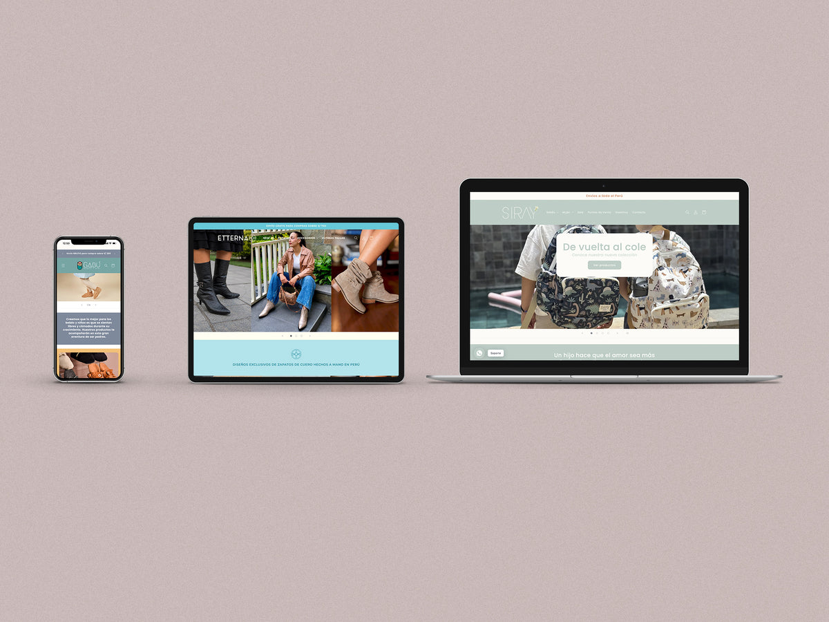 Un iphone, un ipad y una laptop abierta sobre un fondo color entero. En la pantalla del iphone se muestra la página web de las marca Gabú, en la pantalla del ipad se muestra la página web de la marca Etterna y en la laptop se muestra la página web de la marca Siray.
