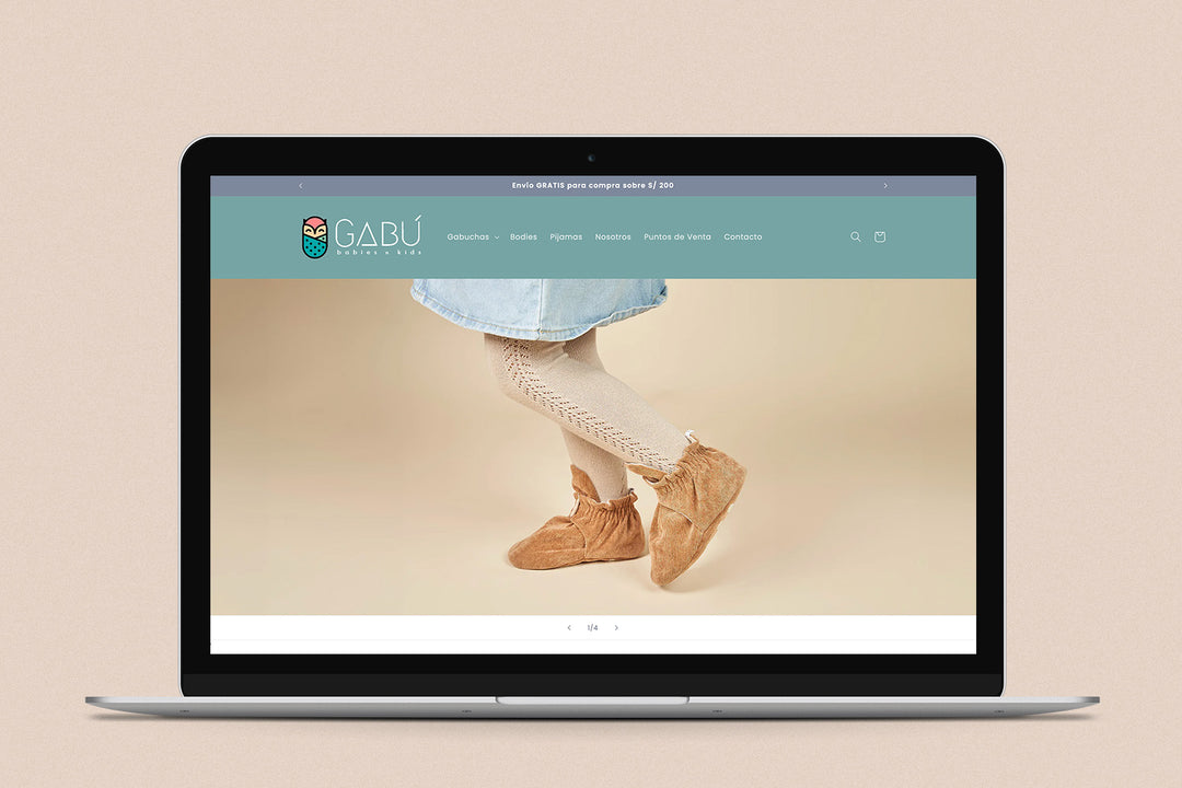 Imagen de una laptop con la web de Gabú en su pantalla.