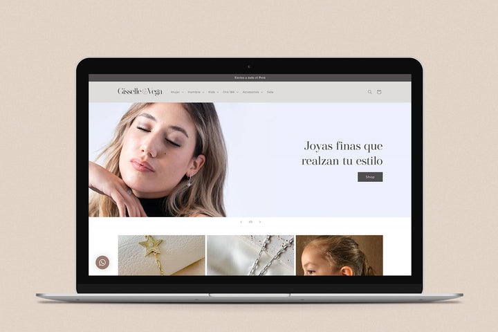 Imagen de una laptop con la web de Gisselle Vega Joyas n su pantalla.