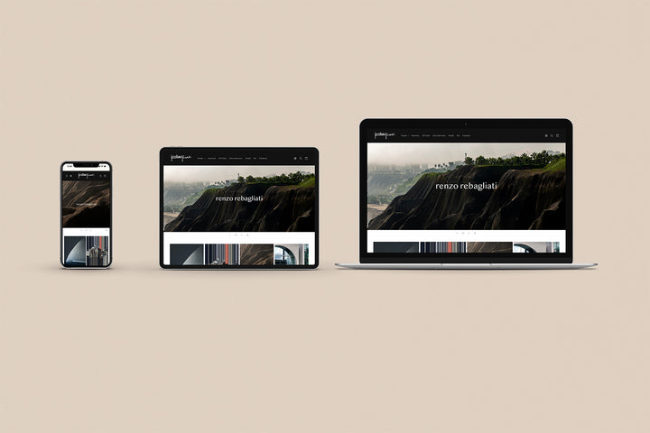 Imagen de un iphone, un ipad y una laptop con la web de Renzo Rebagliati en sus pantallas.