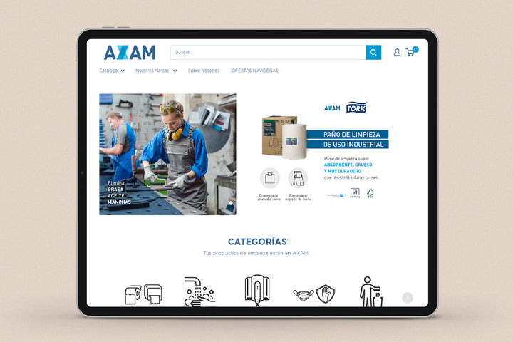 Imagen de un ipad con la web de  Axam en su pantalla.