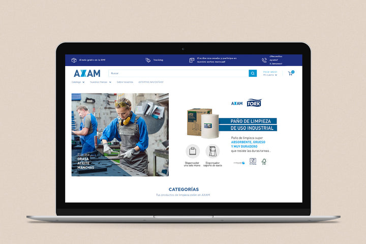 Imagen de una laptop con la web de  Axam en su pantalla.