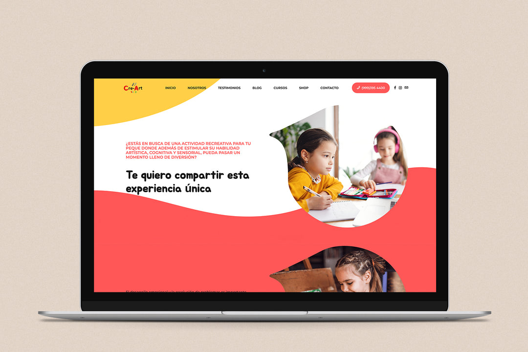 Imagen de una laptop con la web de Cre-Art Kids en su pantalla.