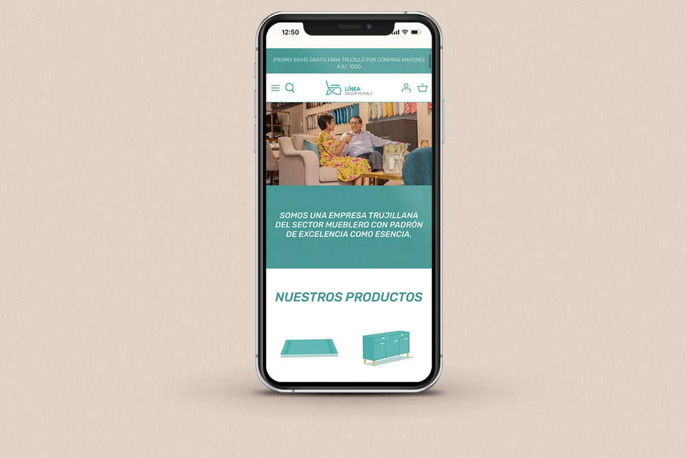 Imagen de un iphone con la web de Línea Decor Mueble en su pantalla.