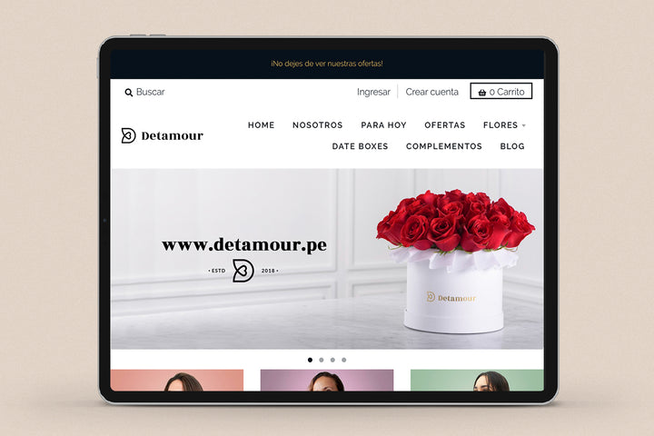 Imagen de un ipad con la web de Detamour en su pantalla.