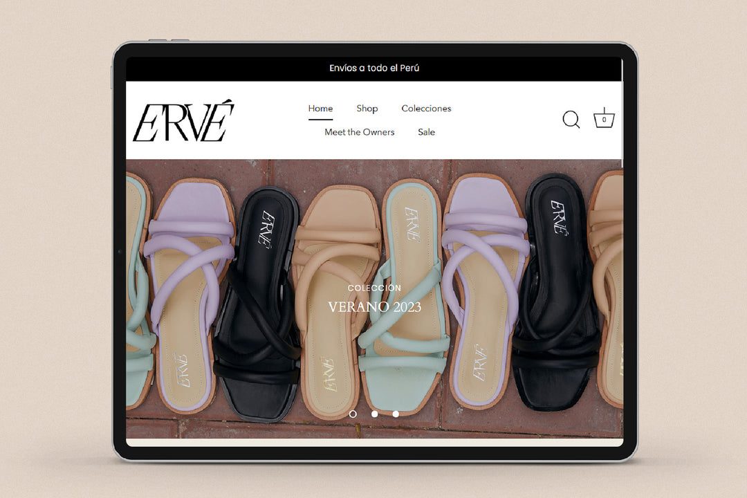 Imagen de un ipad con la web de  Ervé en su pantalla.