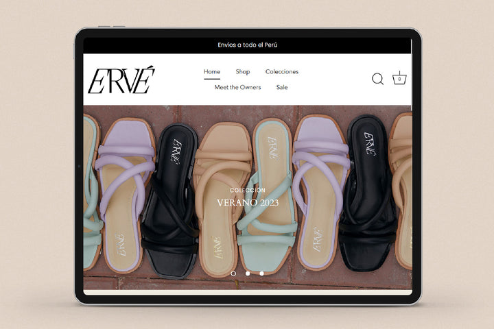 Imagen de un ipad con la web de  Ervé en su pantalla.