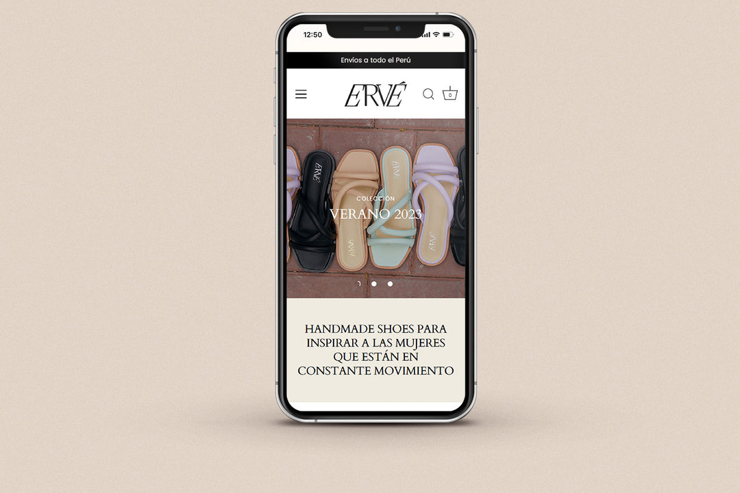 Imagen de un iphone con la web de  Ervé en su pantalla.