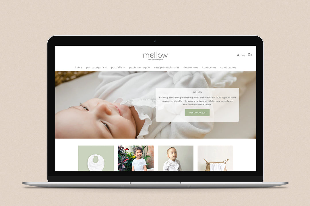 Imagen de una laptop con la web de Mellow The Baby Brand en su pantalla.