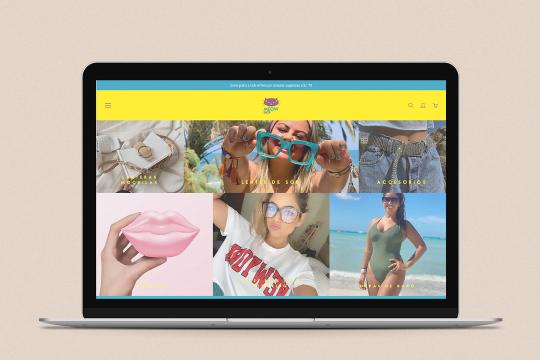 Imagen de una laptop con la web de Meow Shop en su pantalla.