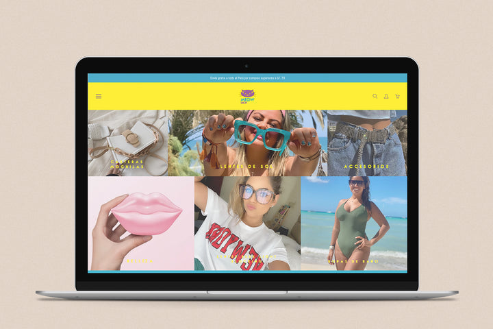 Imagen de una laptop con la web de Meow Shop en su pantalla.