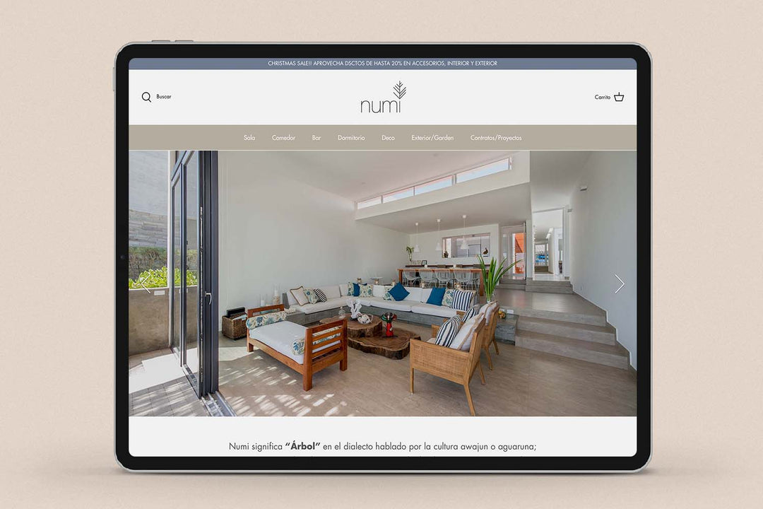 Imagen de un ipad con la web de  Numi en su pantalla.