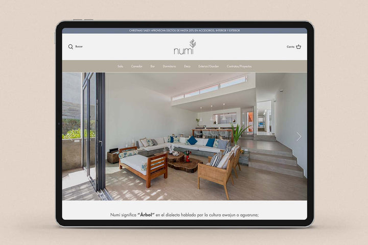 Imagen de un ipad con la web de  Numi en su pantalla.